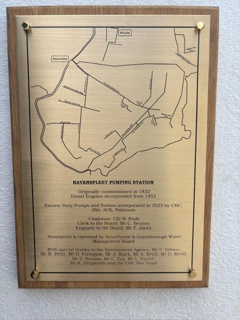 A plaque commemorating the pumping station refurbishment and the acknowledging the work of the august individuals involved.